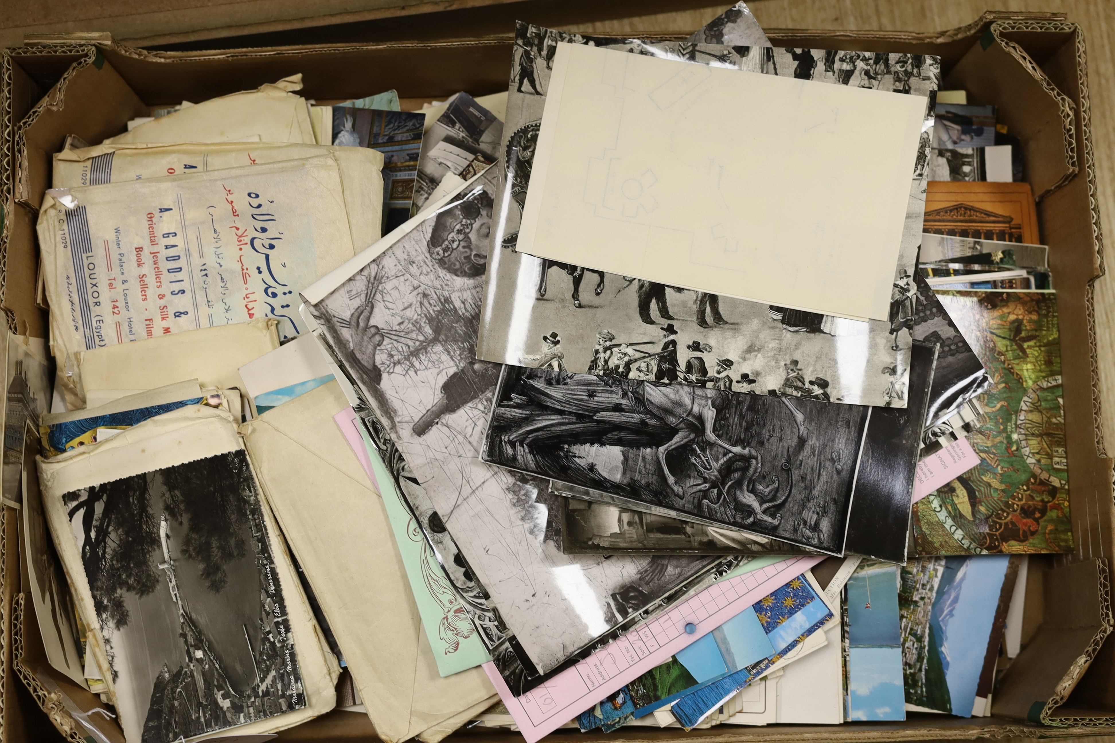 A quantity of postcards photos